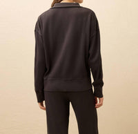 Faherty Women's Surf Waffle Henley Top in washed black - women's long sleeve top - detail view