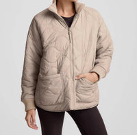 BEYOND YOGA Two-way Quilted Jacket in oat latte - women's jacket