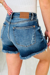 66Disco - Asymmetric Raw Hem Distressed Whiskery Denim Shorts