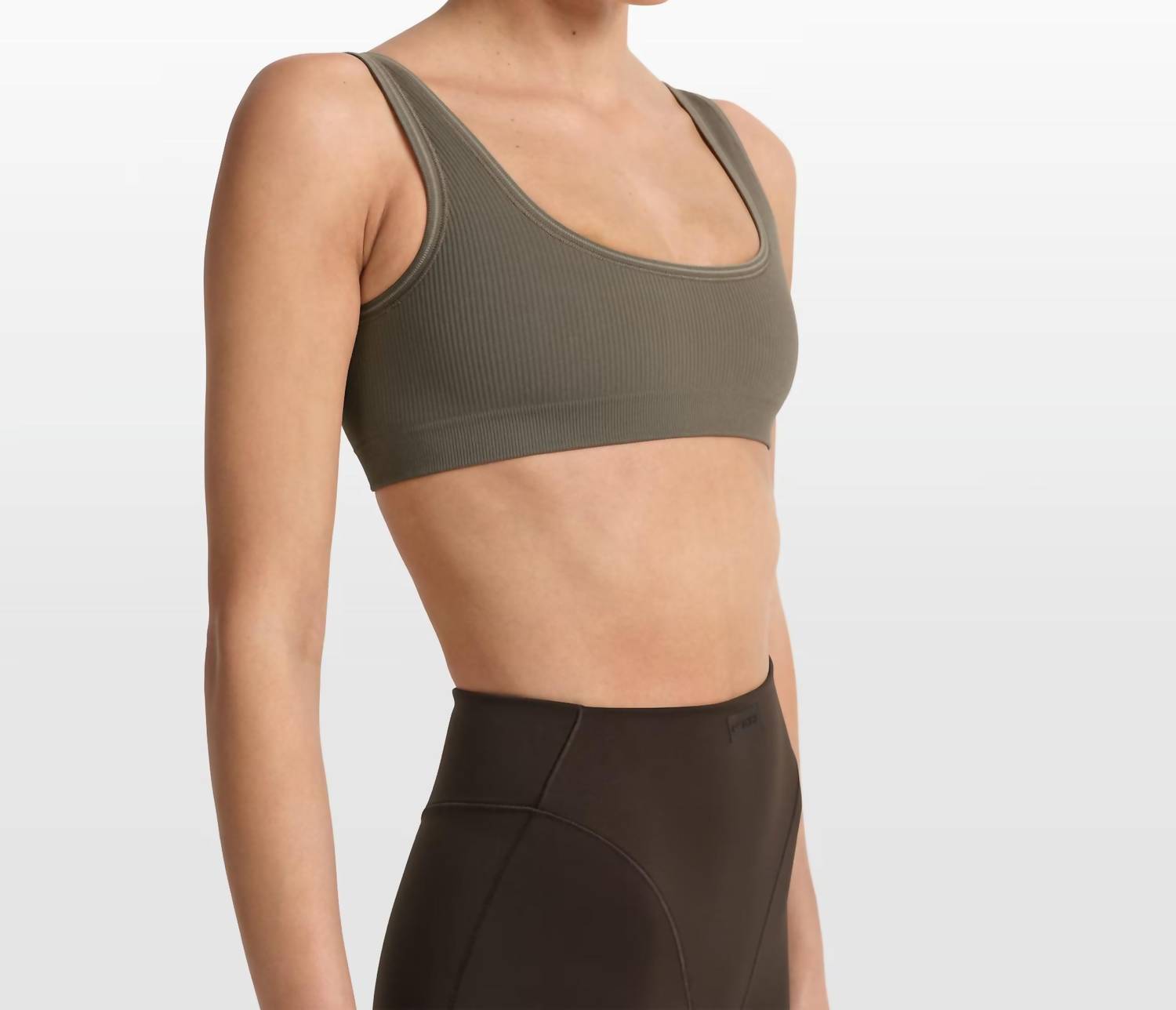 NikeSKIMS Ribbed Seamless Micro Scoop Bra in dune - women's intimate - detail view