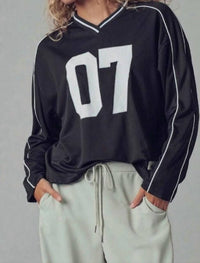 Urban Daizy Varsity 07 Graphic V-neck Jersey Top in black - women's long sleeve top - detail view