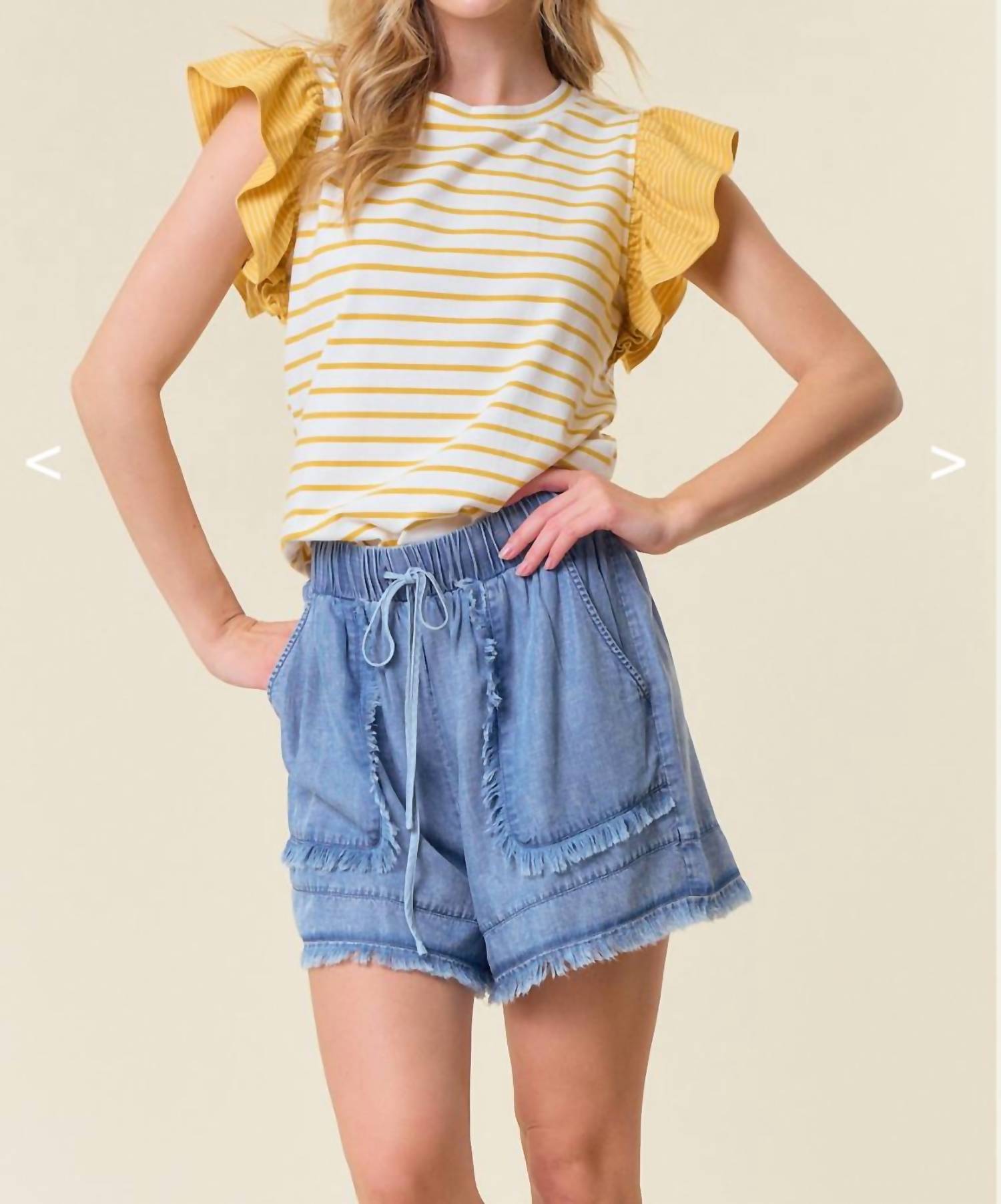 Doe and Rae Denim Fray Detail Shorts in light wash - women's shorts - detail view