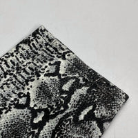 alice + olivia Women’s Snakeskin Skinny Jeans in black white - women's jeans - alternate view