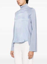 SIMKHAI Mateo Long-sleeve Turtleneck Combo Top in marino blue - women's long sleeve top - detail view