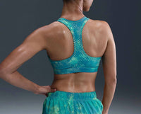 NIKE Women's Dri-FIT Swoosh Medium Support Sports Bra in blue - women's intimate - detail view