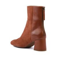 WOMEN'S UNEASY BOOTS