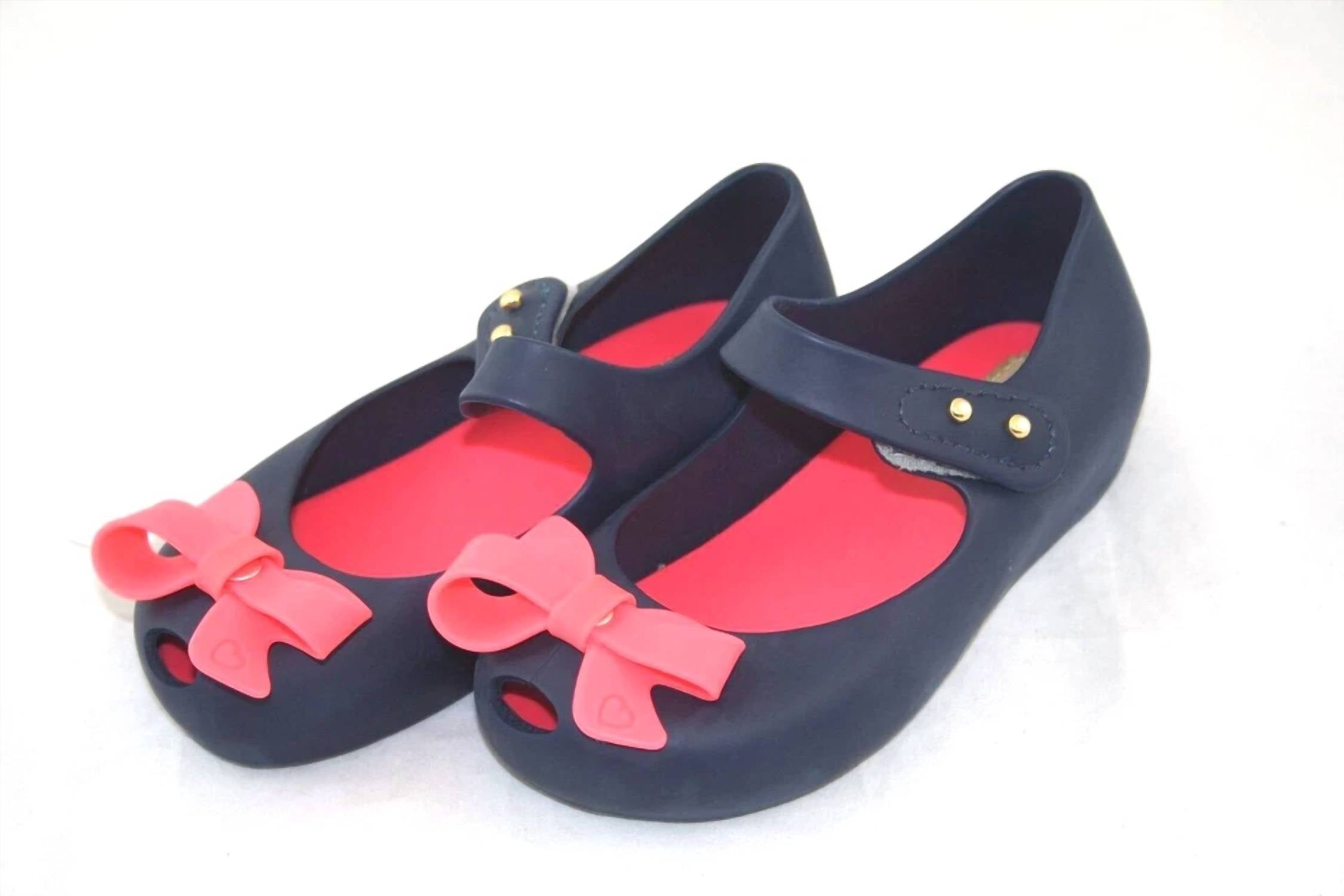 Mini Melissa Girl's Ultragirl Bow Flat Shoes in pink black - kids' shoe - detail view