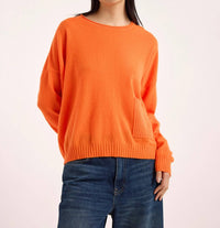 Brodie Cashmere Piper Rib Detail Pocket Cashmere Crewneck Top in neon orange - women's long sleeve top - view 4