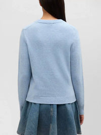 GANNI Teddy Graphic Wool Sweater in baby blue - women's sweater - detail view