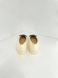 Stuart Weitzman - Women's Sleek Bow Flat Sandal