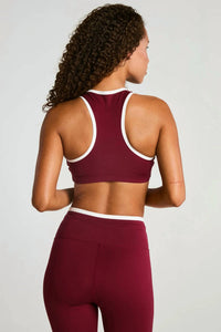 YEAR OF OURS Court Sport Bra in burgundy cream - women's intimate - detail view