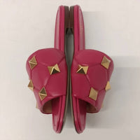 Valentino Garavani Women's Roman Stud Quilted Leather Slides in pink gold - women's shoe - alternate view