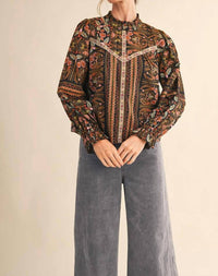 &merci Ruffle Collar Floral Botanical Blouse in black border print - women's blouse
