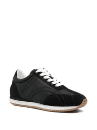 TOTEME Women's Sport Sneakers in black - women's sneaker - detail view