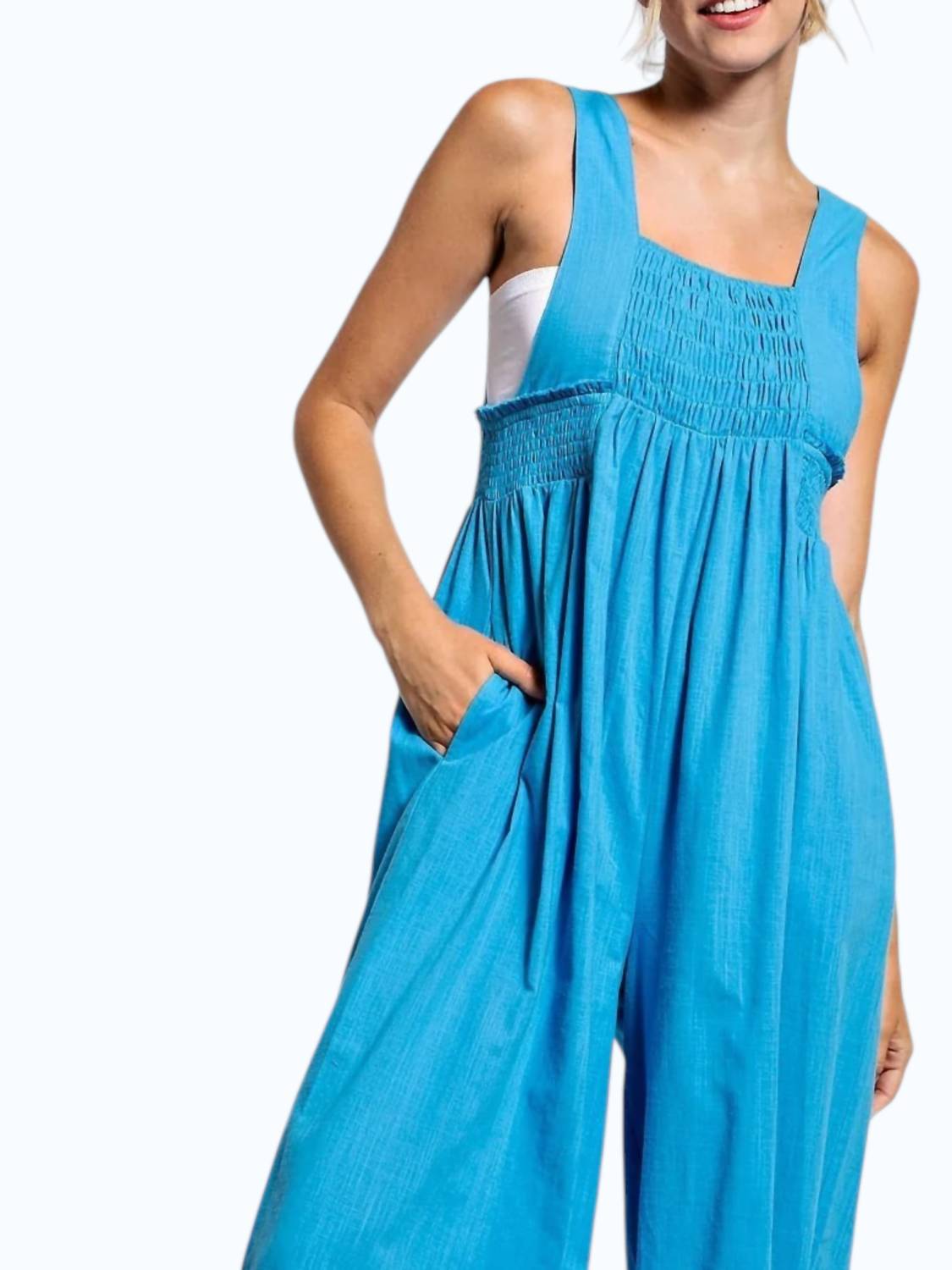 LLOVE Smocked Textured Jumpsuit in blue - women's pants - detail view