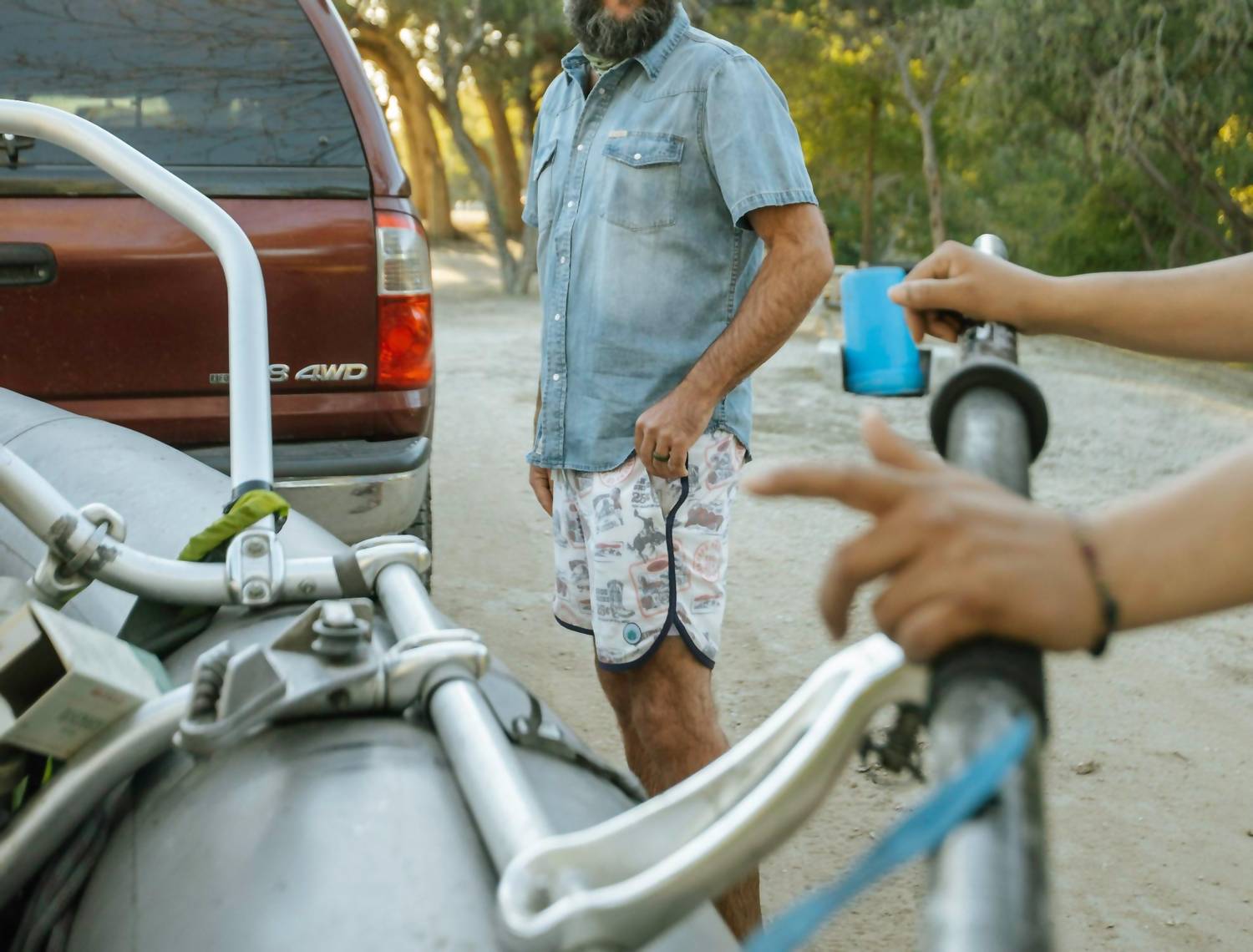 Sendero Provisions Co. Wyatt Pearl Snap Short Sleeve Shirt in vintage denim - men's t-shirt - detail view