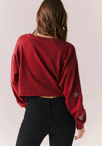 Chaser Distressed Stars Long Sleeve Top in carmine red - women's long sleeve top - detail view