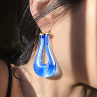 Gold & Honey - Women's Large Twisted Horseshoe Lucite Hoop Earrings