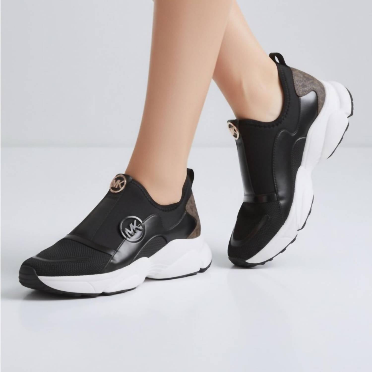 MICHAEL KORS Women's Sami Trainer Wedge Sneakers in black and brown - women's sneaker - detail view
