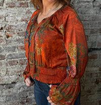 PAPARAZZI Print Shirred Peasant Top in rust - women's blouse