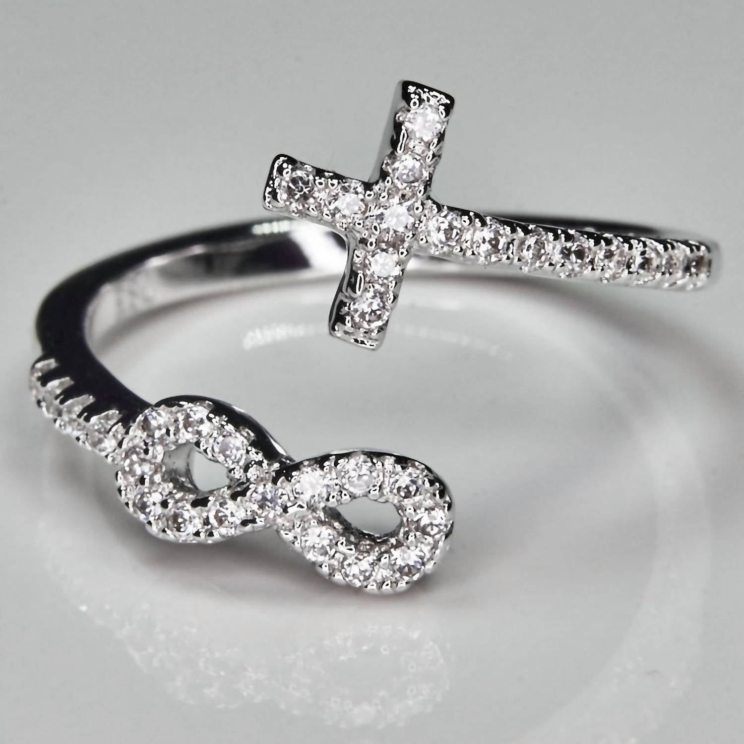 Faire - INFINITY CROSS RHODIUM PLATED