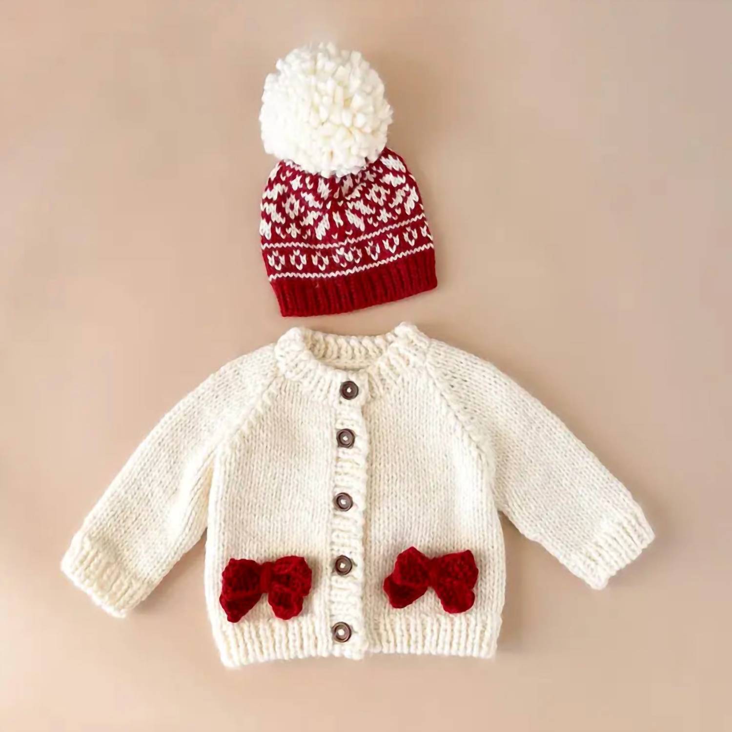 The Blueberry Hill Kid's Cozy Knit Cardigan With Bow in cream red - kids' sweater