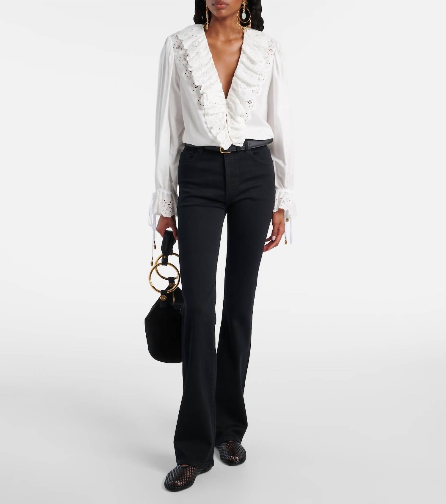 FRAME The Reboot High Rise Boot Cut Jeans in black - women's jeans