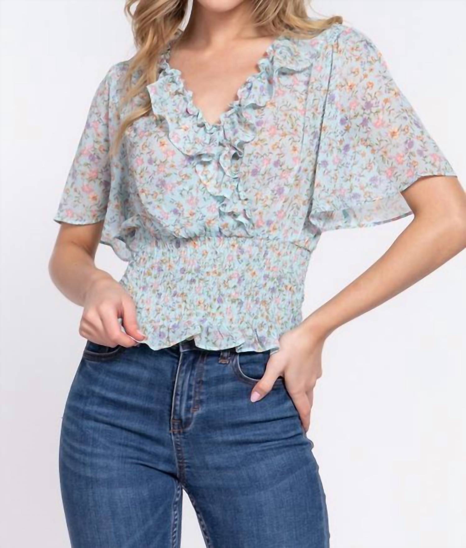 Active Basic Flutter Sleeve V-Neck with Ruffle Smocked Waist Chiffon Top in blue floral - women's blouse