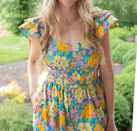 &merci Super Trouper Floral Jumpsuit in yellow blue - women's pants - detail view