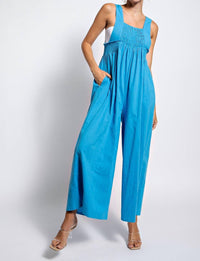 LLOVE Smocked Textured Jumpsuit in blue - women's pants