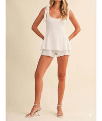 Klesis - Textured Flare Bow Strap Romper