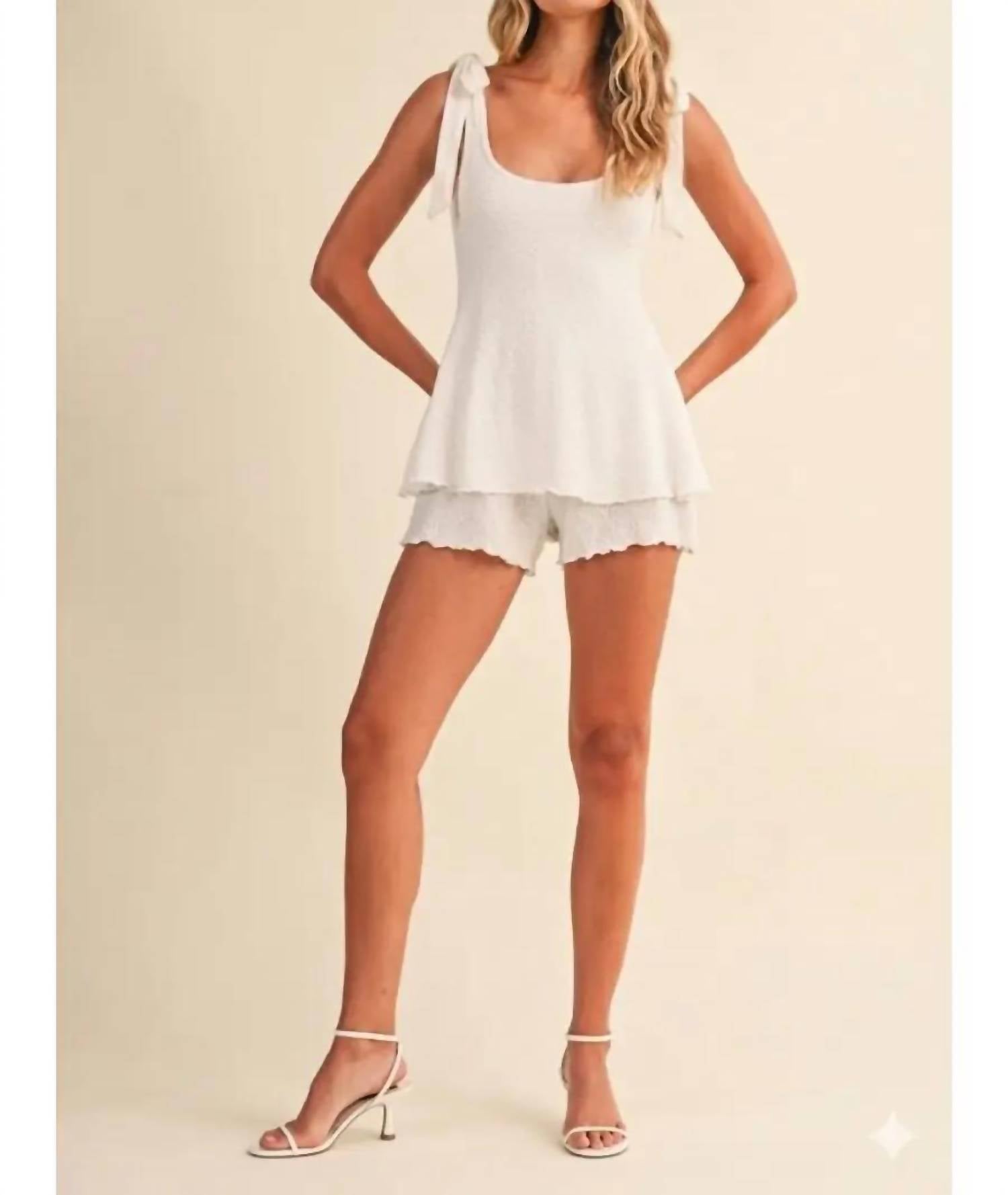 Klesis - Textured Flare Bow Strap Romper