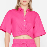 FRAME Cropped Twist Front Top in flamingo pink - women's blouse