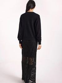 Brodie Cashmere Gem Star Cashmere Crew Neck Jumper in black - women's sweater - detail view