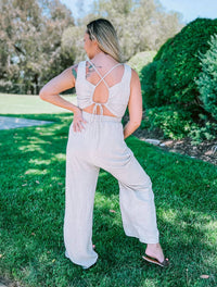 GILLI Criss-Cross Tie Back Elastic Waist Jumpsuit in oatmeal - women's pants - detail view