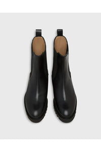 Ann Mashburn Women's Tall Lug Sole Chelsea Boot in black leather 1 - women's shoe - detail view