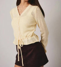 LE LIS Peplum Cardigan in butter - women's cardigan - detail view
