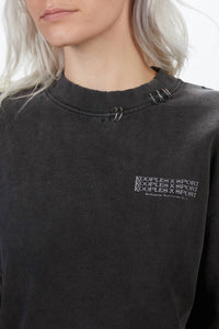 SWEATSHIRT WITH PRINT AND PIERCING