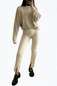 HIGH-RISE VEGAN LEATHER SPLIT-HEM PANTS