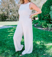 GILLI Criss-Cross Tie Back Elastic Waist Jumpsuit in oatmeal - women's pants