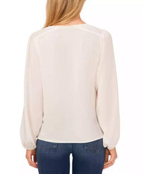 CeCe Long Sleeve Tie Up V-neck Blouse in off white - women's blouse - detail view