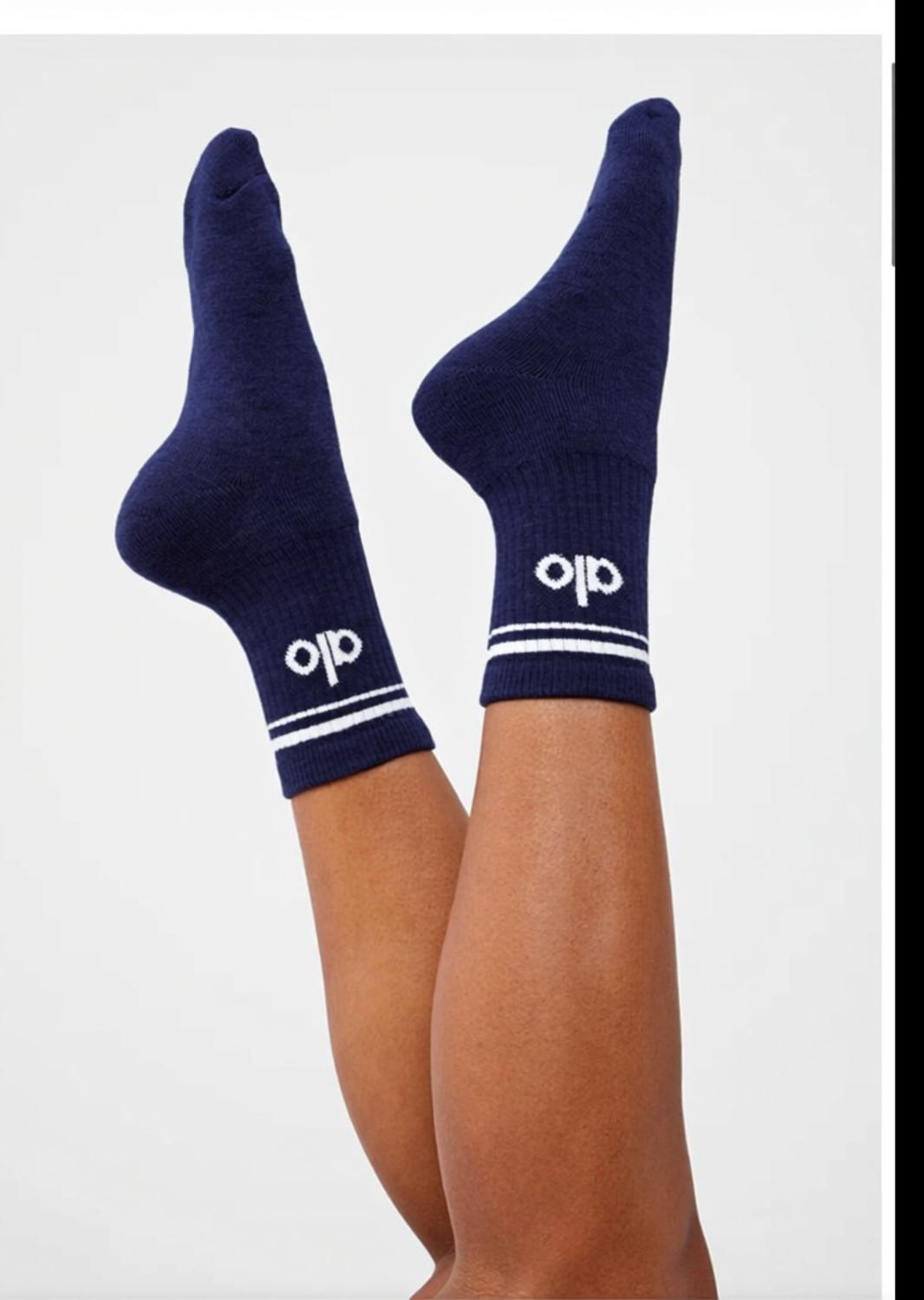 ALO YOGA Unisex Half Crew Throwback Sock in navy white - women's accessory - detail view