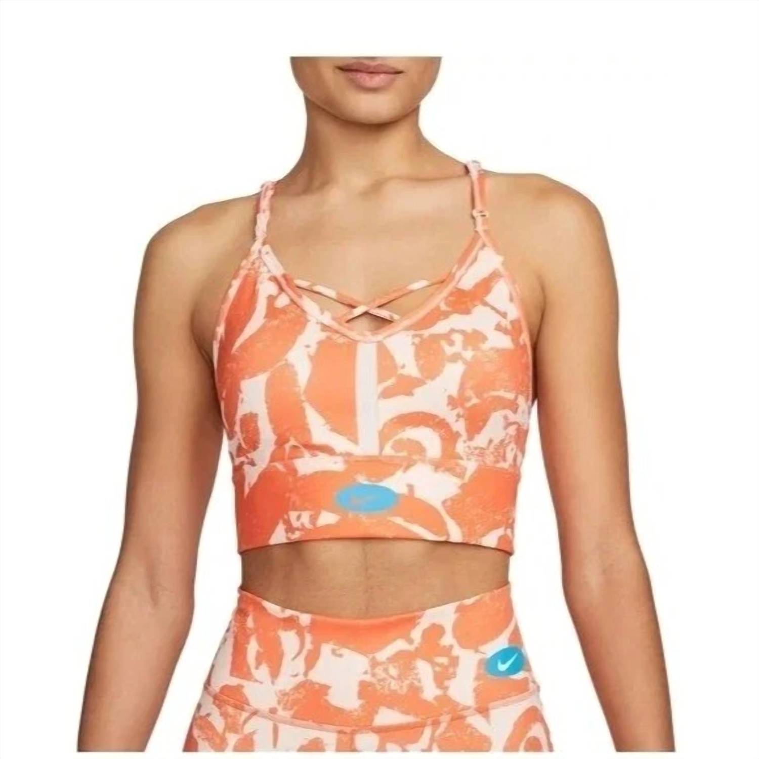 NIKE Women's Dri Fit Icon Sports Bra in orange - women's intimate