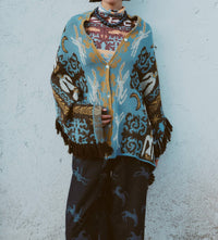 Carolina K - Pampa Poncho
