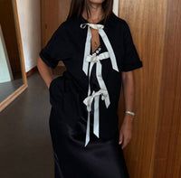 Never Fully Dressed - Bow Back T Shirt
