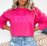 The White Invite Xoxo Embossed Sweatshirt in pink - women's top