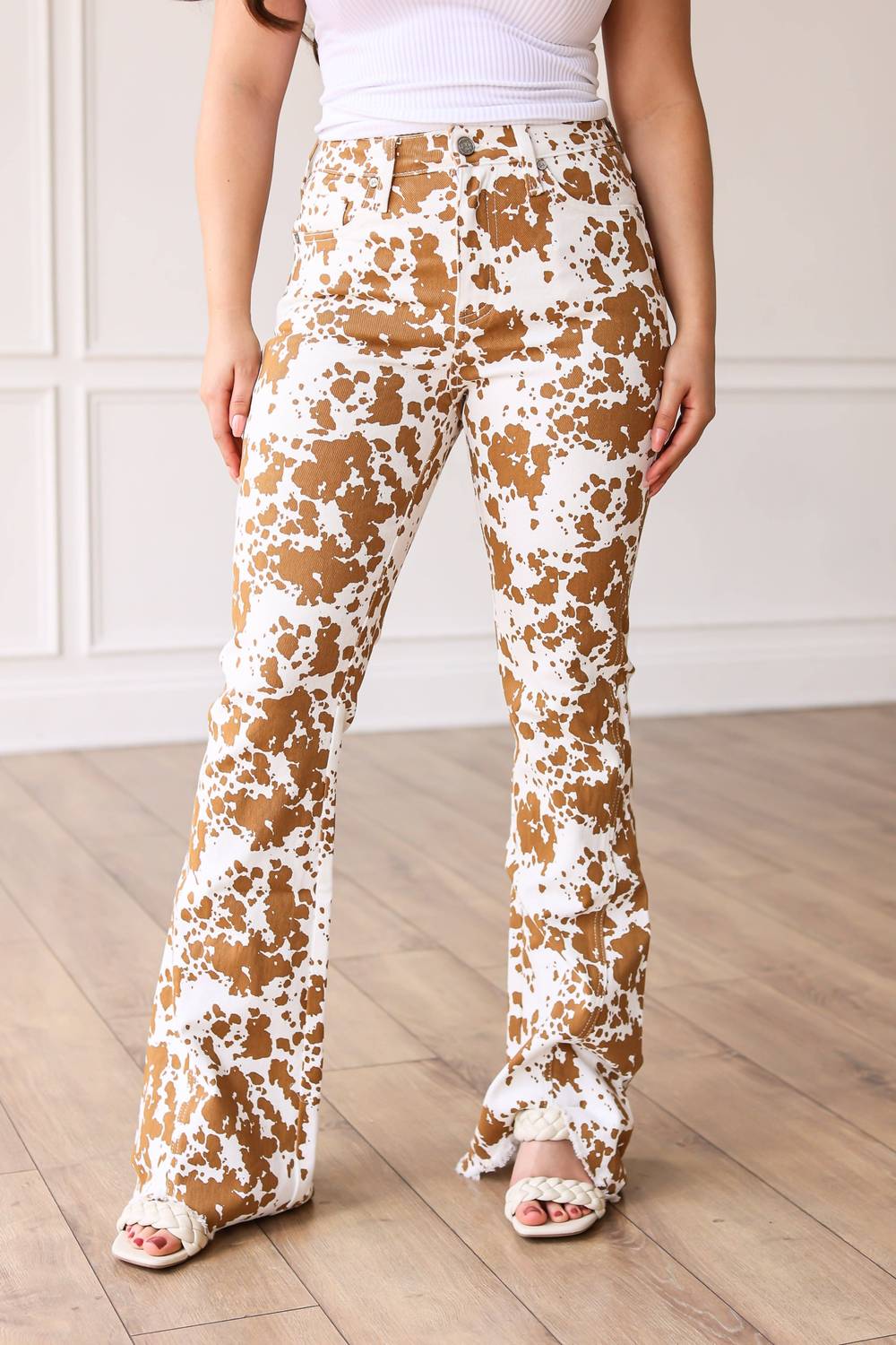 Emma Grace Shoppe - The Sadie Cowhide Flare With Fray Hem Pants