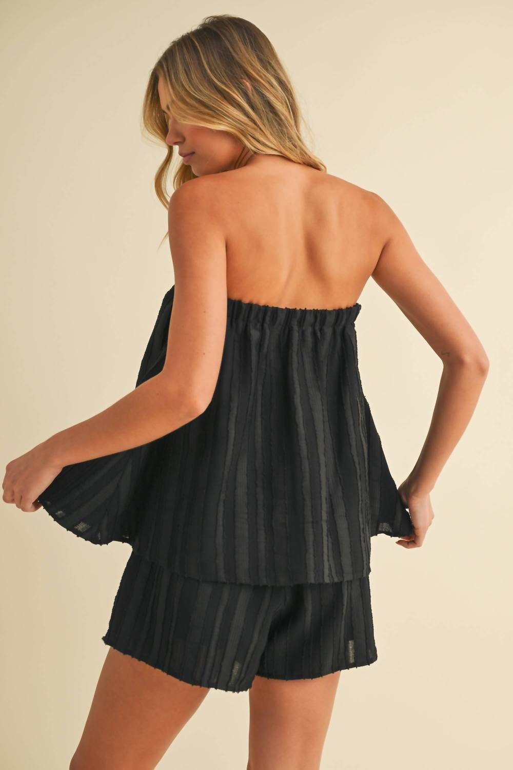 Klesis Flowy Textured Tube Top Romper in black - women's pants - detail view