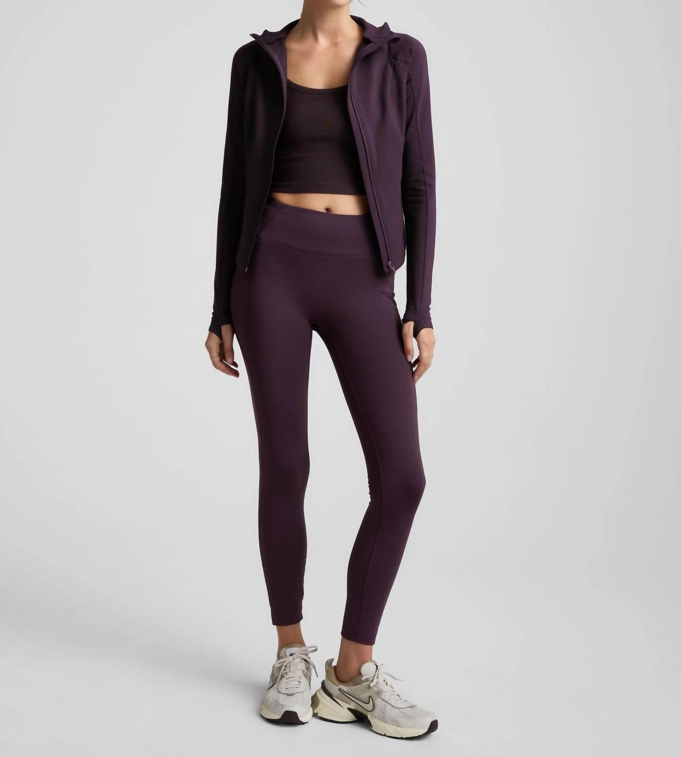 BEYOND YOGA pacer fleece zip pocket long legging in eggplant - women's pants