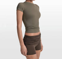 NikeSKIMS Ribbed Seamless Short Sleeve Top in oak moss dune - women's t-shirt - detail view